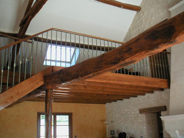 Escalier bois et garde corps à balustre en fer forgé