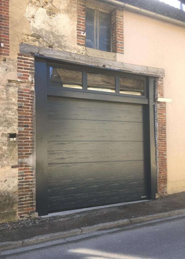 Porte sectionnelle et imposte mixte bois alu vitré